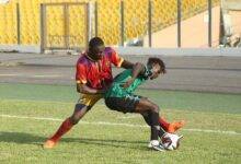 • Hearts defender Dennis Korsah in a tussle with Samuel Tetteh Mensah for the ball