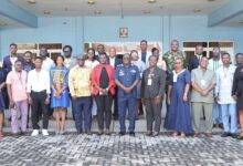 Air Commodore George Arko-Dadzie(middle) and Prof. Kwesi Aning(fifth from left) with facilitators and participants at the workshop