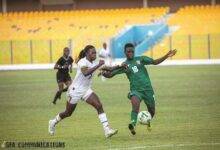 Mary Amponsah (left) in a tussle for the ball with her opponent