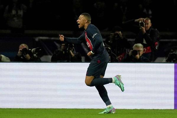 Mbappe celebrates after scoring his side's opening goal against AC Milan at Parc des Princes stadium in Paris on Wednesday,