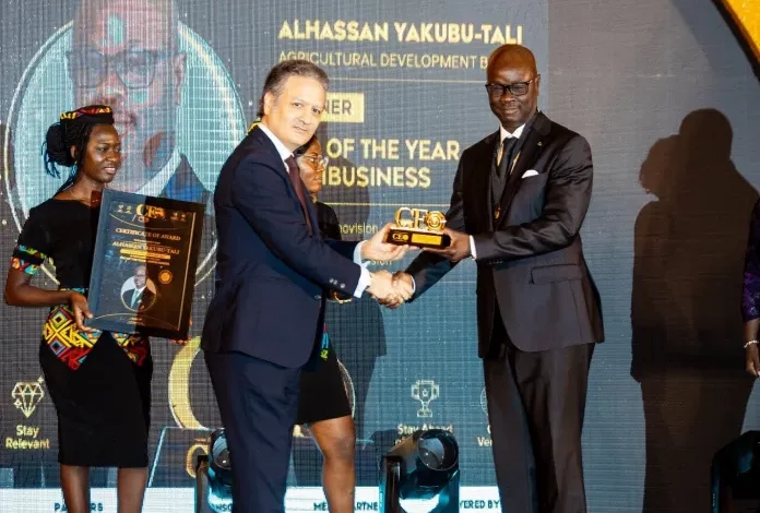 Mr Yakubu-Tali (right) receiving his award