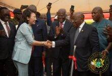 Ms Yang Yang (left) welcoming President Akufo-Addo