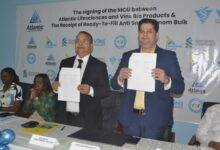 Mr Tripathi (second from right) and Mr Daga displaying the MoU. With them is Dr Delese Darko Photo: Victor A. Buxton