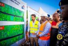 • Alhaji Farouk Aliu Mahama (second from left) and his team being briefed about the project