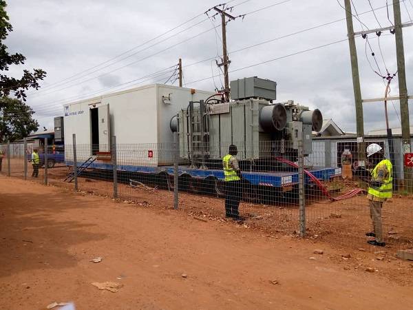 Engineers of ECG working on the mobile substation at Oyarifa
