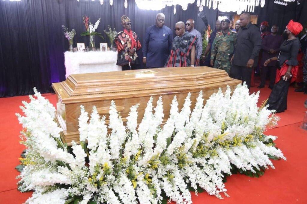 President Akufo-Add-(third from left) and his delegation filing past the casket.