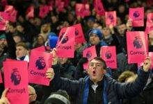 • A section of the fans bearing cards branding the EPL as corrupt