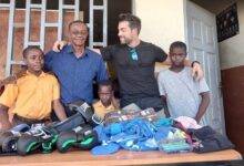 • Ataa Lartey (second left) with a member of the Zenzero team and some of the children at the academy