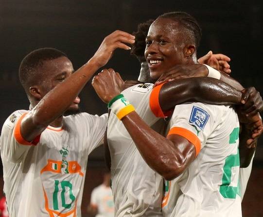 Christian Kouame (right) joined by team mates to celebrate his goal