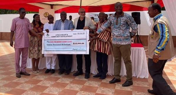 • Dr Baah (third from left) and other dignitaries displaying the dummy cheque