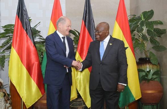President Akufo-Addo (left), in a handshake with Olaf Scholz, German Chancellor at the Jubilee House