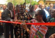 • Inset: Mrs Owusu-Ekuful (right), cutting tape with Osabarima Appenteng II to commission the facility