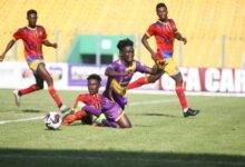 Kelvin Osei Asibey displaces Godknows Dzakpasu off the ball during the game Photo Raymond Ackumey
