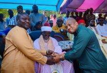 • Sheikh Osman Nuhu Sharubutu (middle) and Mr Gyato presenting the items to Mr Samuel Okudzeto Ablakwa (right)
