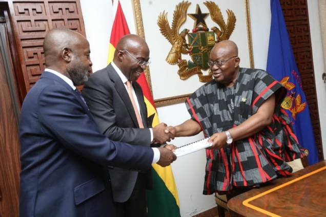 President Akufo-Addo, right, receiving the report from Mr Michael Ansah(middle)