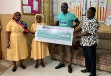 • Mr Gyebi (second from right) handing over the cheque to the Sisters