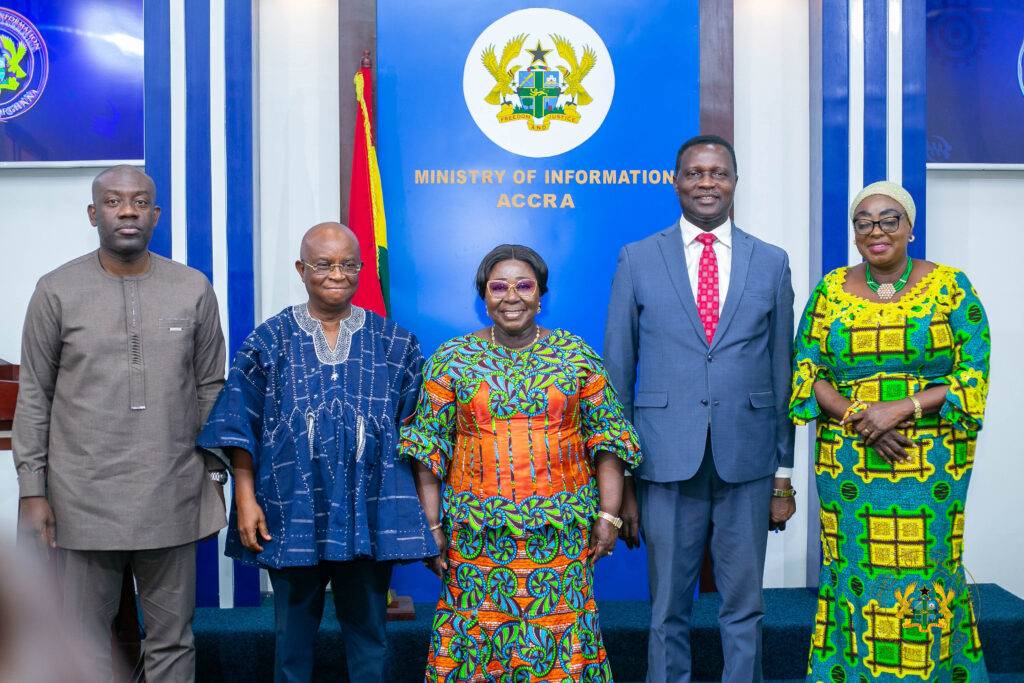 • Mrs Akosua Frema Osei-Opare
(middle) with the ministerial committee
members after the presser