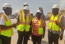 • Mr Komla Mensah (second from right), Project Engineer, Takoradi Port, briefing Mr Asiamah (third from right) and the delegation during the visit