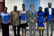 • Ambassador Maher Kheir (fourth from right) with the beneficiaries