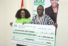 • Mr Frimpong Addo (right) and Ms Eno Ofori-Atta showing the dummy cheque after the presentation Photo: Ebo Gorman