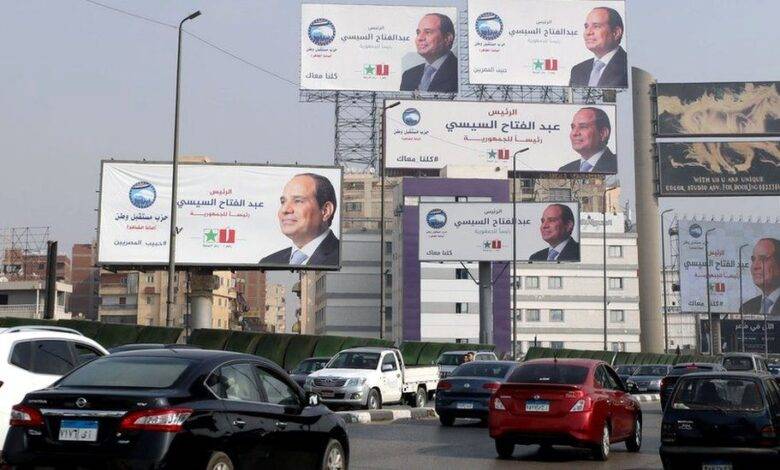 • Banners bearing photos of President Abdul Fattah al-Sisi are on every street corner in Cairo