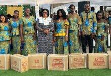 Dr Agnes Naa Momo Lartey in group photograph with beneficiaries