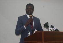 Dr.Yaw Osei Adutwum (inset) addressing participants in the lecture. Photo Stephanie Birikorang