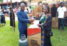 • Dr Dominic Eduah (left) presenting a start-up tool to one of the beneficiaries