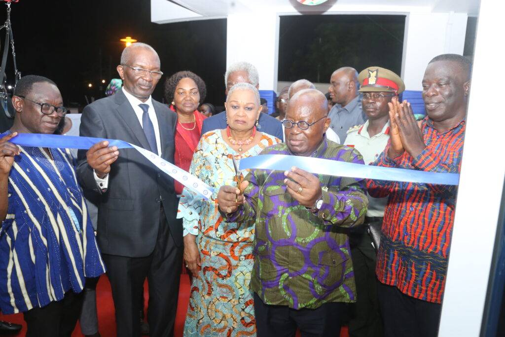 President Akufo-Addo being supported by Mr.Dan Acheampong (second from left), and Mr Ignatius Baffour Awuah (right) to inaugurate the building