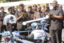 (inset) IGP,Dr George Akuffo Dampare (left),Mr Keli Gadzekpo (second from right) and Mr Samuel Dubik(right) applauding after the presentation of the motorbikes. Photo. Ebo Gorman