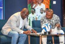 • Mr Okraku (left) and Tachie signing their sponsorship agreement