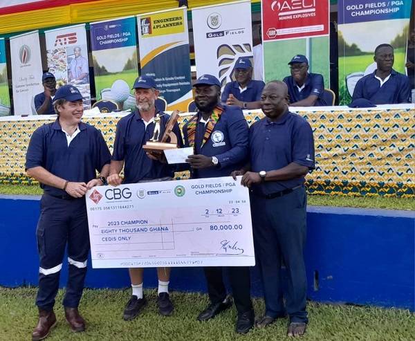 • Mr Van Der Merwe (second left), General Manager of Gold Fields and Alhaji Ahmed Padori of PGA (right) presenting prizes to Sunday Olapade.