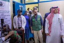Mr Al-Bakr (right) and officials of the foundation at the eye screening centre