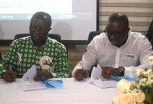 Mr Osei Assibey Antwi (left) and Mr Daniel Fahene Aquaye signing the MoU Photo: Stephanie Birikorang