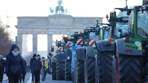 • Tractors lined up outside Berlin's Brandenburg Gate during a blockade earlier this month