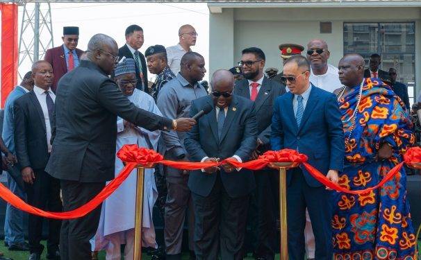 (inset)President Akufo-Addo(middle)cuts the tape to commission the project