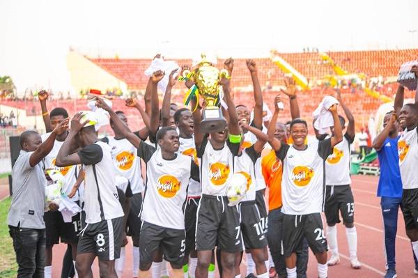 • The Kumasi Anglican SHS team celebrating with the trophy