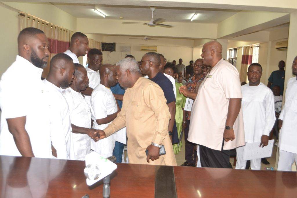 Mr Henry Quartey (second from right) and other dignitaries congratulating the newly sworn in assembly members at Ledzokuku Photo Victor A. Buxton