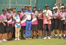 • Mr Ayeh (sixth left) with Kwabena Poku (with trophy) and other participants