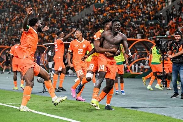 Players of Cote d Ivoire celebrating their second goal