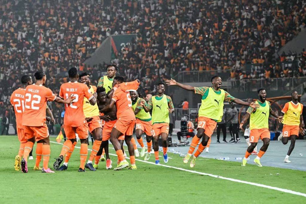 Players of Cote d Ivoire celebrating their semi-finals qualification