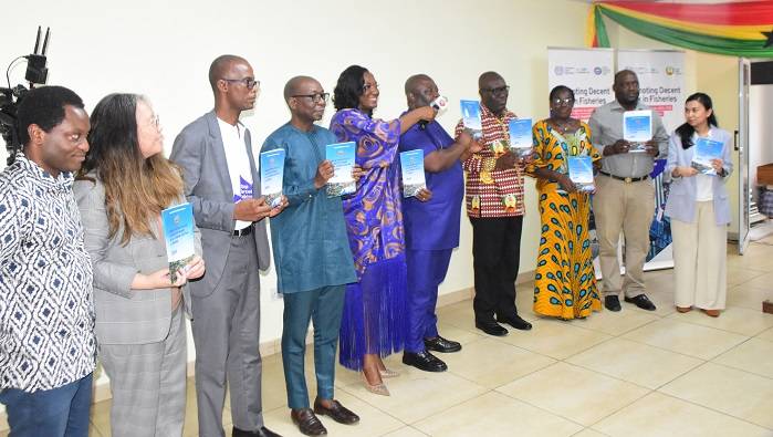 • Nii Adjei Brown (fifth from right) and others launching the policy Photo: Seth Osabukle