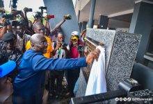 • Dr Bawumia unveils a plaque to commission the University of Ghana Sports Complex