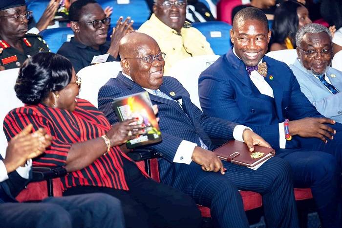 • President Akufo-Addo (middle) in a discussion with Dr Okoe Boye (right) and Chief of Staff, Mrs Akosua Frema Opare, at the book launch