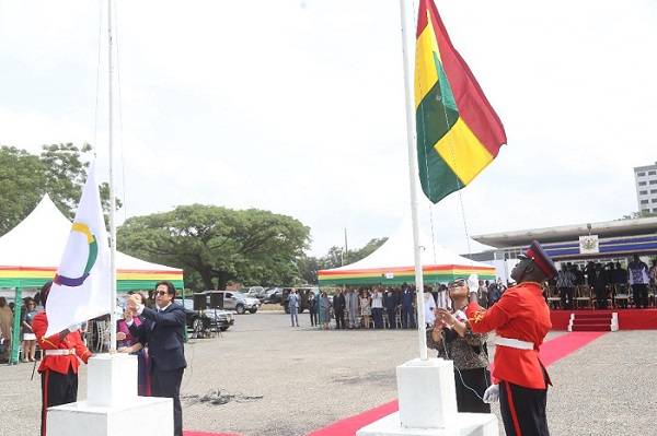 • Ms Shirley Ayorkor Botchwey (right) and Mr Maher Kheir hoisting the flags during the anniversary