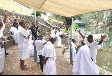 Some Ghanaian pilgrims getting ready to be baptised in the Jordan River