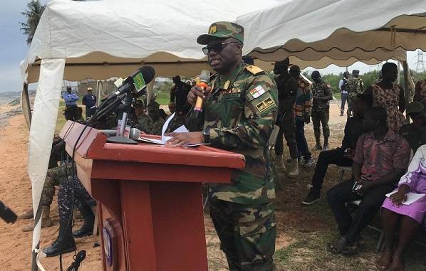 • Inset, Rear Admiral Yakubu speaking at the ceremony to close the exercise