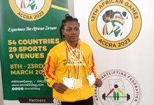 • Ntumi displaying her medals