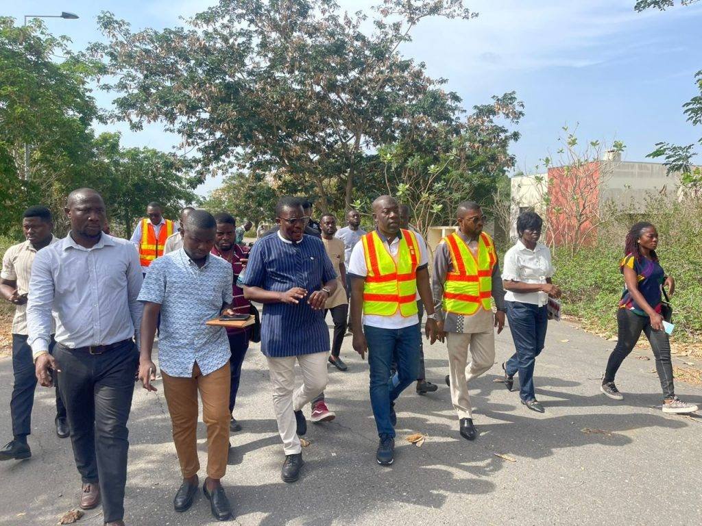 Mr Nkrumah (middle) and his entourage  inspecting the housing project at Saglemi