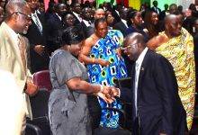 Vice President Bawumia (right) congratulating Chief Justice Gertrude Torkornoo. With them is Mr Francis Torkornoo Photo Seth Osabukle